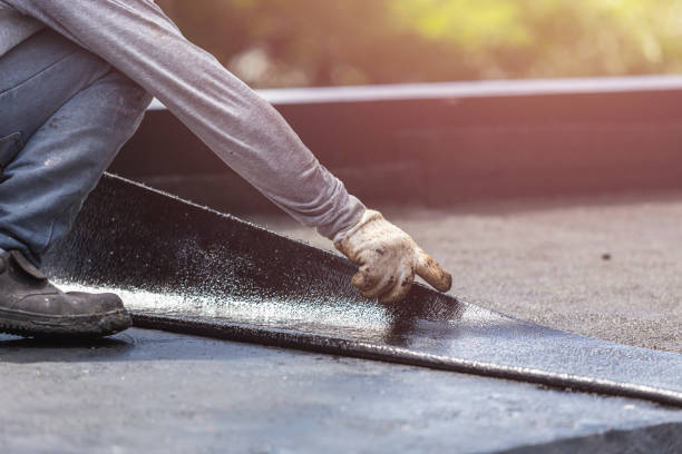 Professional Basement Waterproofing technician working in St. Helena, CA